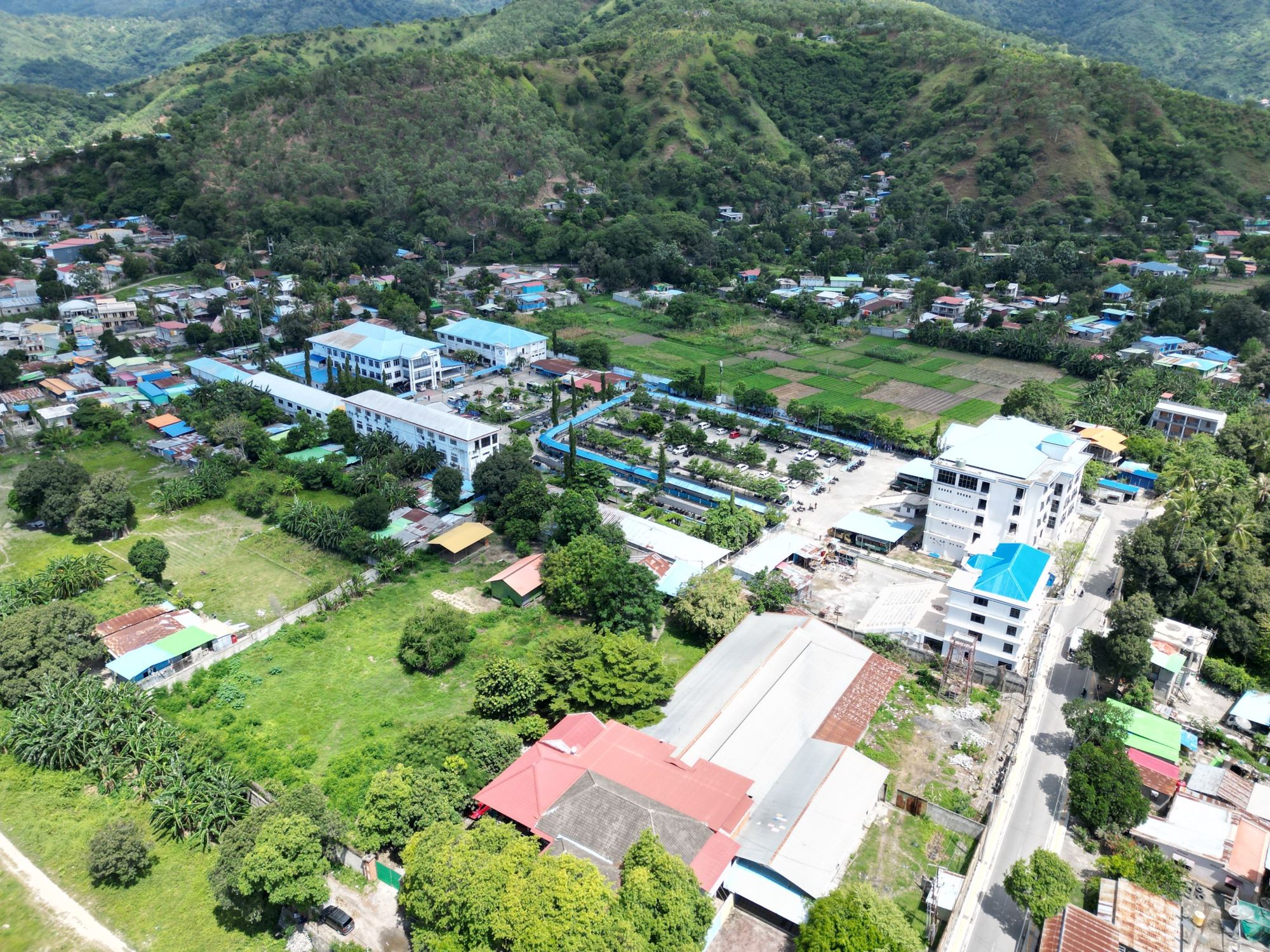 Aerial view of the UNPAZ campus and the hills of Dili